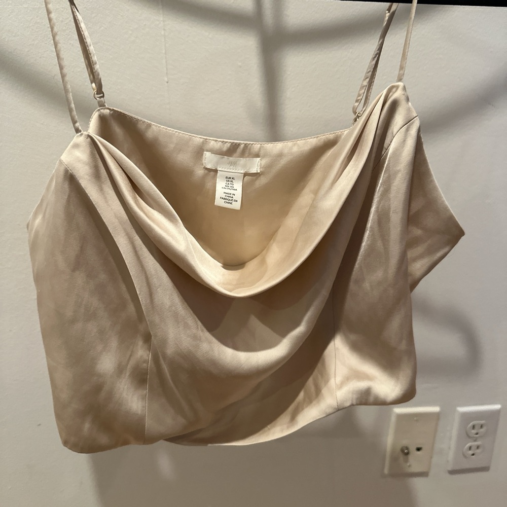 Cream cowl neck crop top with boning.